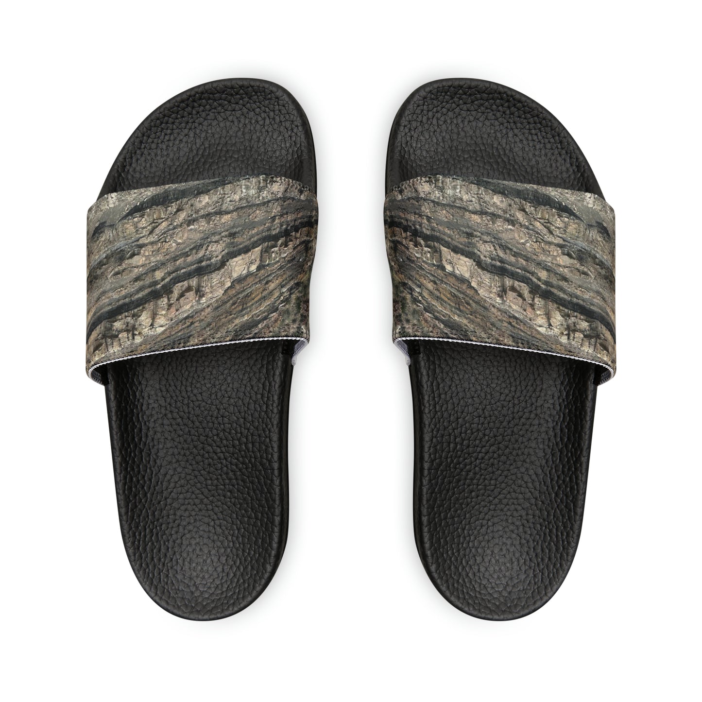 Unwind in total comfort with our easy-to-wear slide sandals, crafted with a cushioned footbed, adjustable straps for a customized fit, and a rubber outsole for durability.