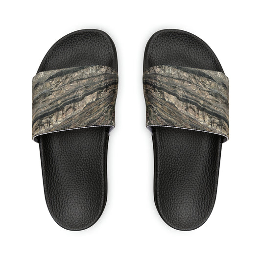 Unwind in total comfort with our easy-to-wear slide sandals, crafted with a cushioned footbed, adjustable straps for a customized fit, and a rubber outsole for durability.