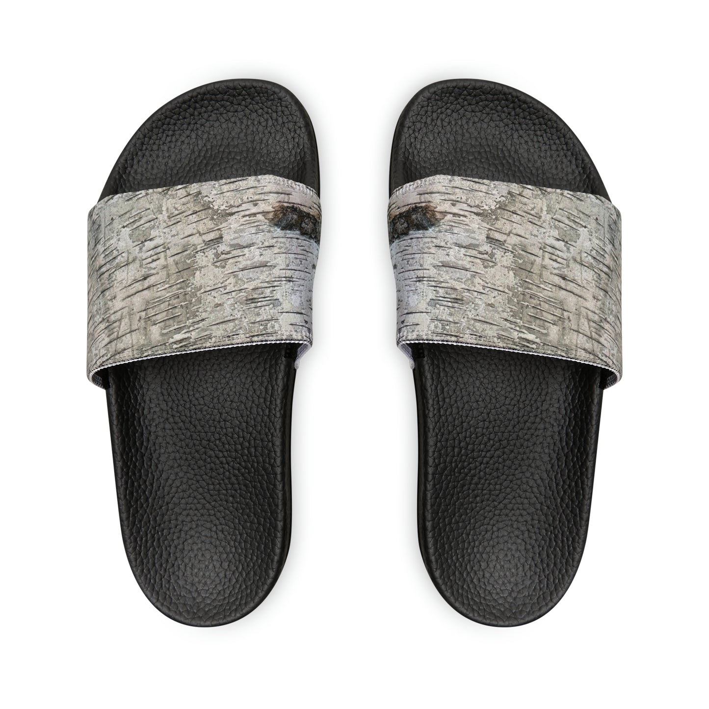 Unwind in total comfort with our easy-to-wear slide sandals, crafted with a cushioned footbed, adjustable straps for a customized fit, and a rubber outsole for durability.