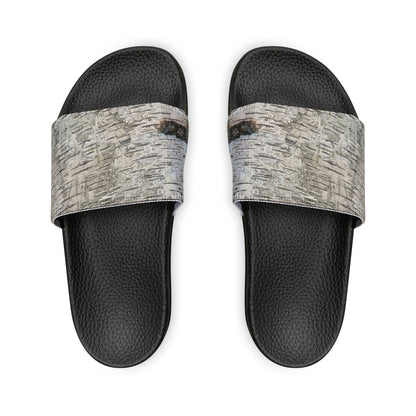 Unwind in total comfort with our easy-to-wear slide sandals, crafted with a cushioned footbed, adjustable straps for a customized fit, and a rubber outsole for durability.