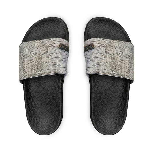 Unwind in total comfort with our easy-to-wear slide sandals, crafted with a cushioned footbed, adjustable straps for a customized fit, and a rubber outsole for durability.